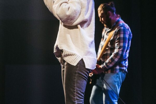 Worship band performing with wireless microphones and personal monitoring at Connexus Church Orillia Campus